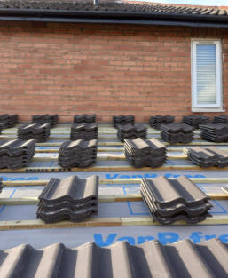 tiles stacked on roof